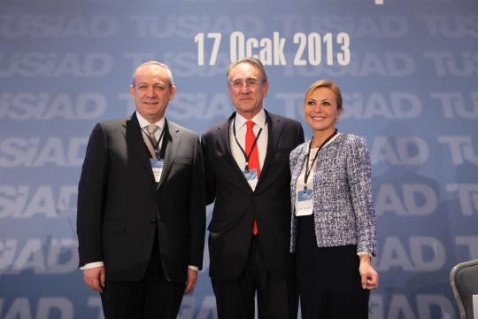 Mr. Muharrem Yilmaz with Mr. Erkut Yucaoglu and Ms. Umit Boyner
